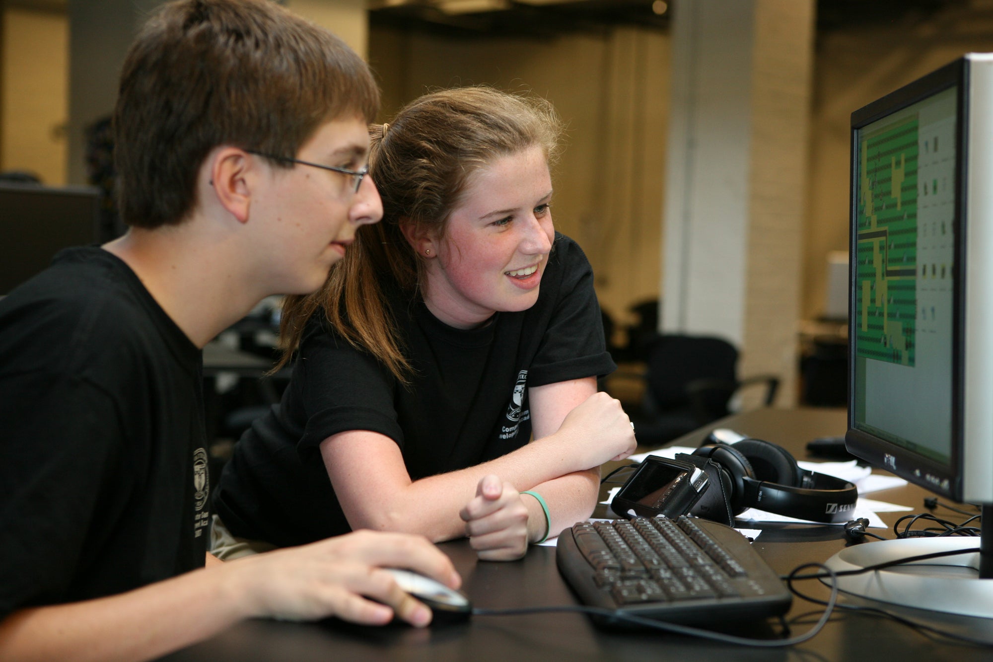 Two students creating a computer game during Summer @ RPI